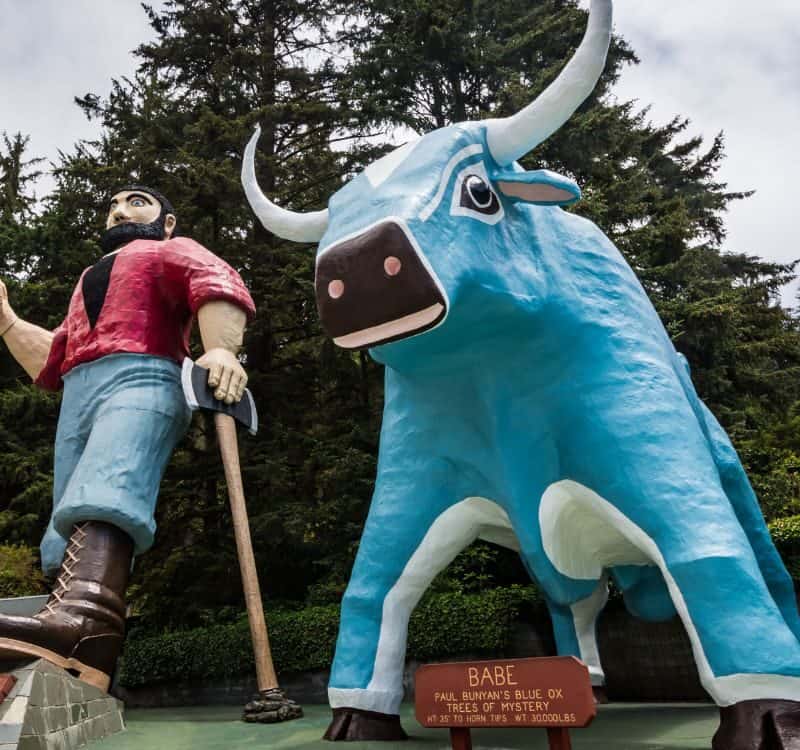 Giant Babe the Blue Ox and lumberjack Paul Bunyan statue at the Tree of Mystery in Klamath, California in the Redwood National Park area