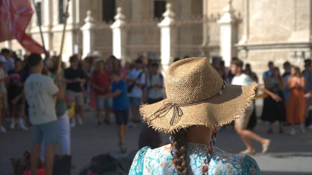 Tourist In Crowd