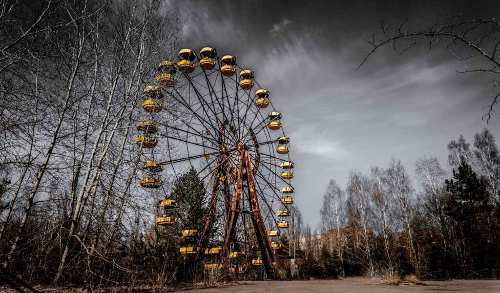 Old ferris wheel in the ghost town of Pripyat. Consequences of the accident at the Chernobil nuclear power plant