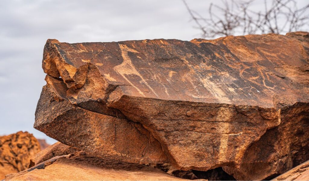 Prehistoric Bushman engravings at Twyfelfontein - Plate with rock paintings from animals and symbols