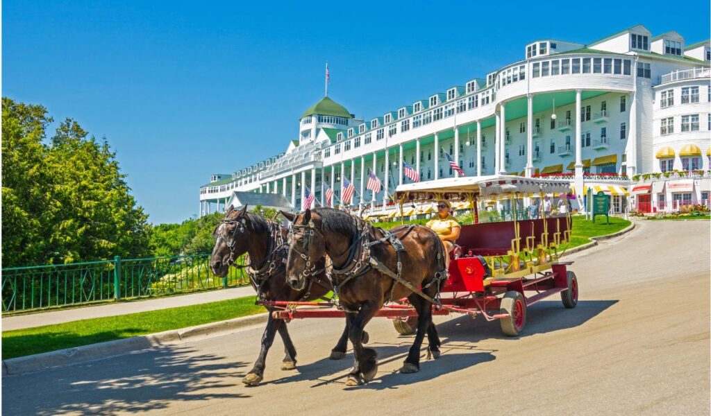 The Grand Hotel on Mackinac Island Michigan showing horse and buggy ride located on Lake Huron, Michigan. created 07.08.23