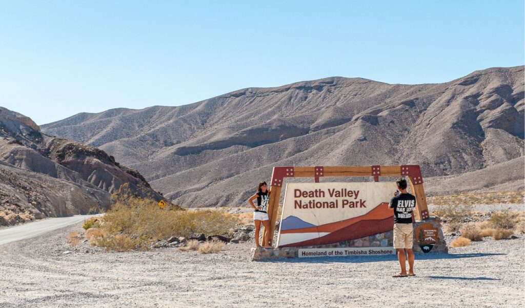 Tourists at the entrance to Death Valley National Park. Death Valley is the hottest place on earth