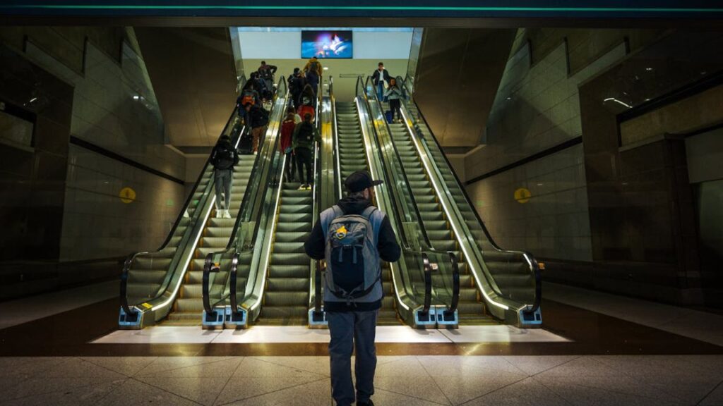 weighing backpack on luggage scale airport