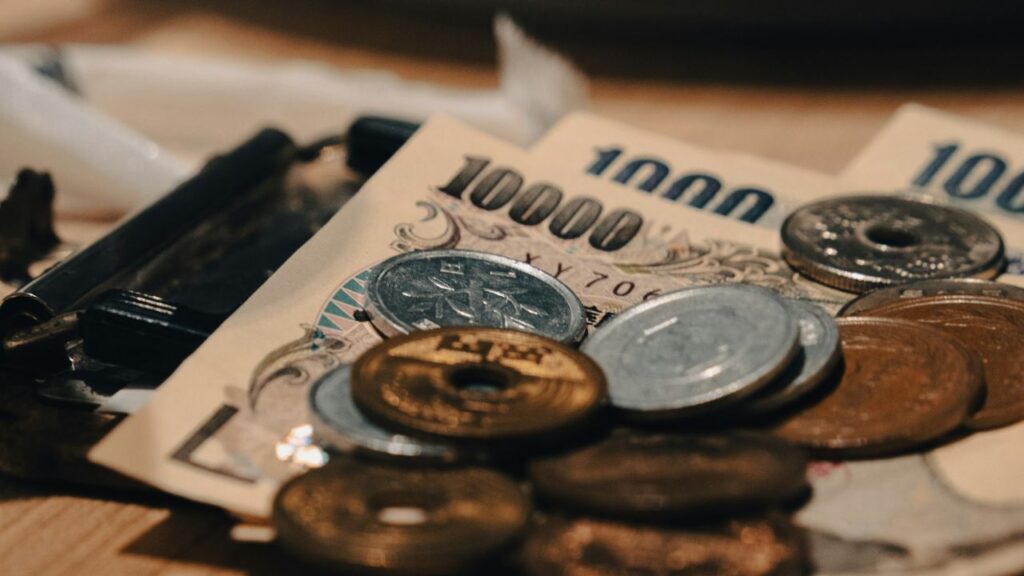 cash tip left on restaurant table coins bills
