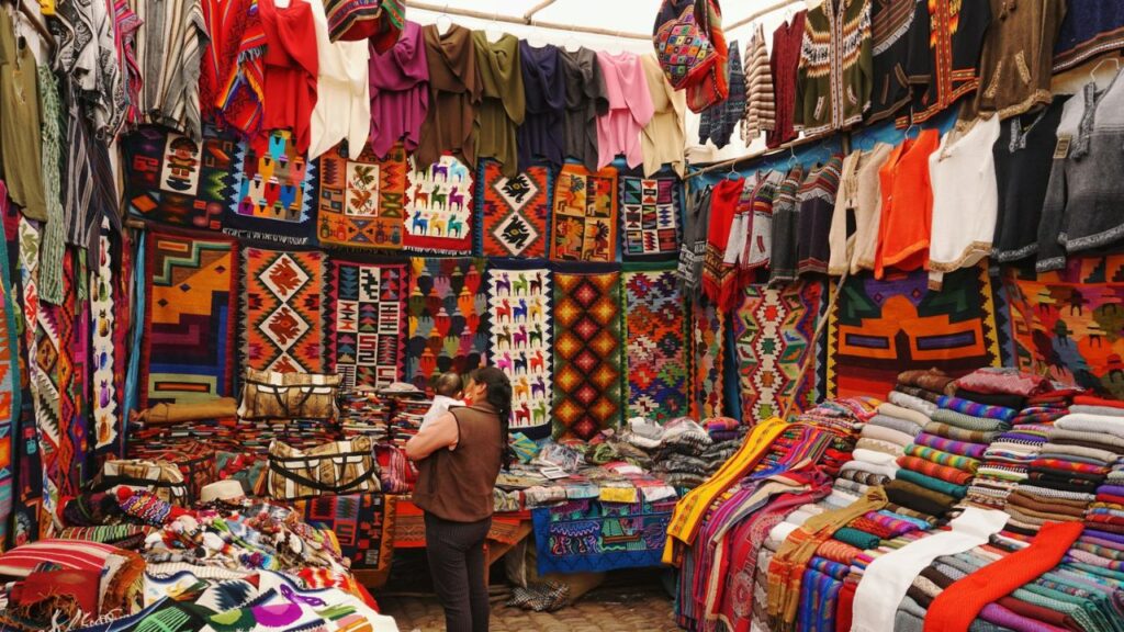 Oaxaca market with colorful textiles