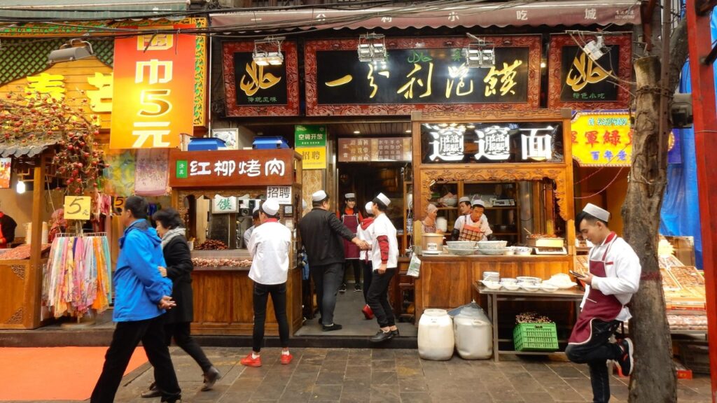 Xi'an, Shaanxi Province, China - November 15, 2017: A busy marketplace selling street food in Xian's Muslim Quarter in the old Silk Road city