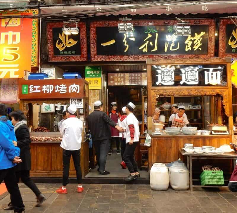 Xi'an, Shaanxi Province, China - November 15, 2017: A busy marketplace selling street food in Xian's Muslim Quarter in the old Silk Road city