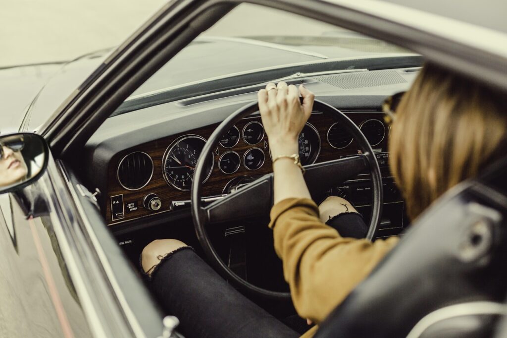 vintage car interior with music playing and warm lighting