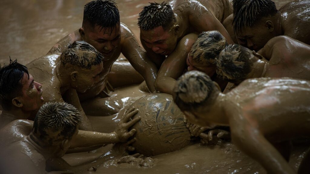 Boryeong Mud Festival Korea beach mud wrestling