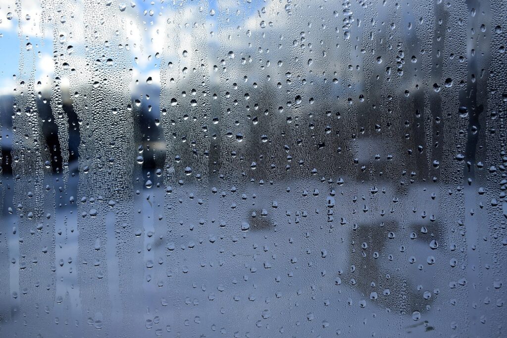 window rain drops inside