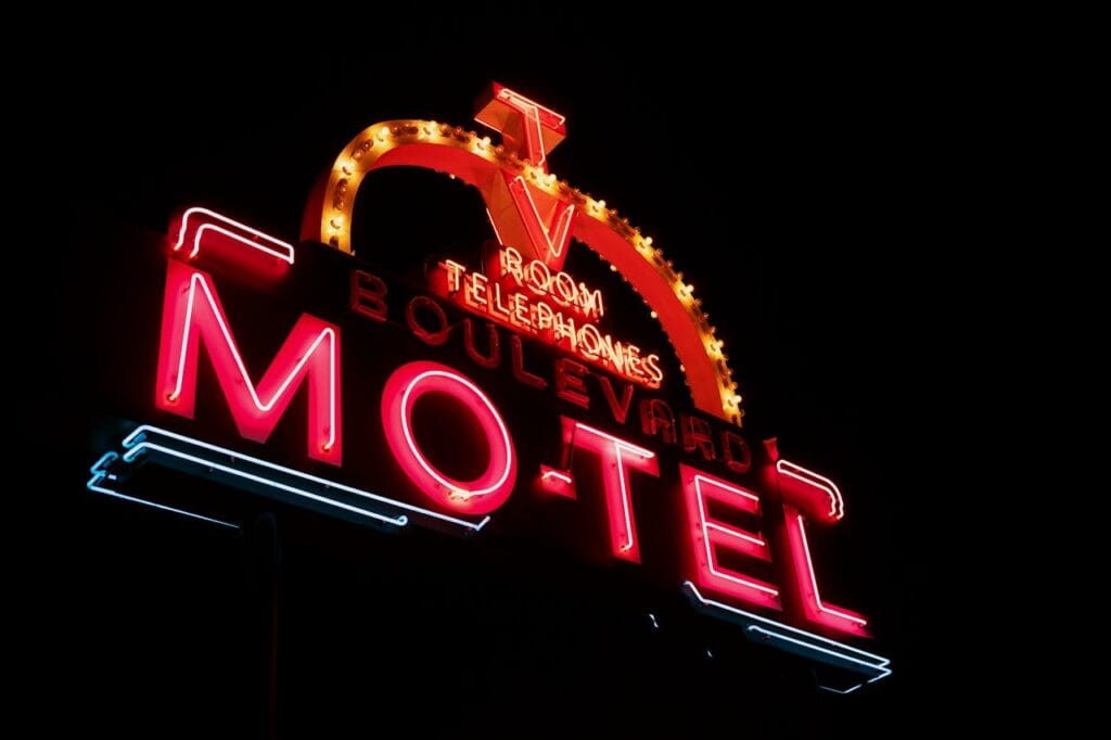 Retro neon motel sign night