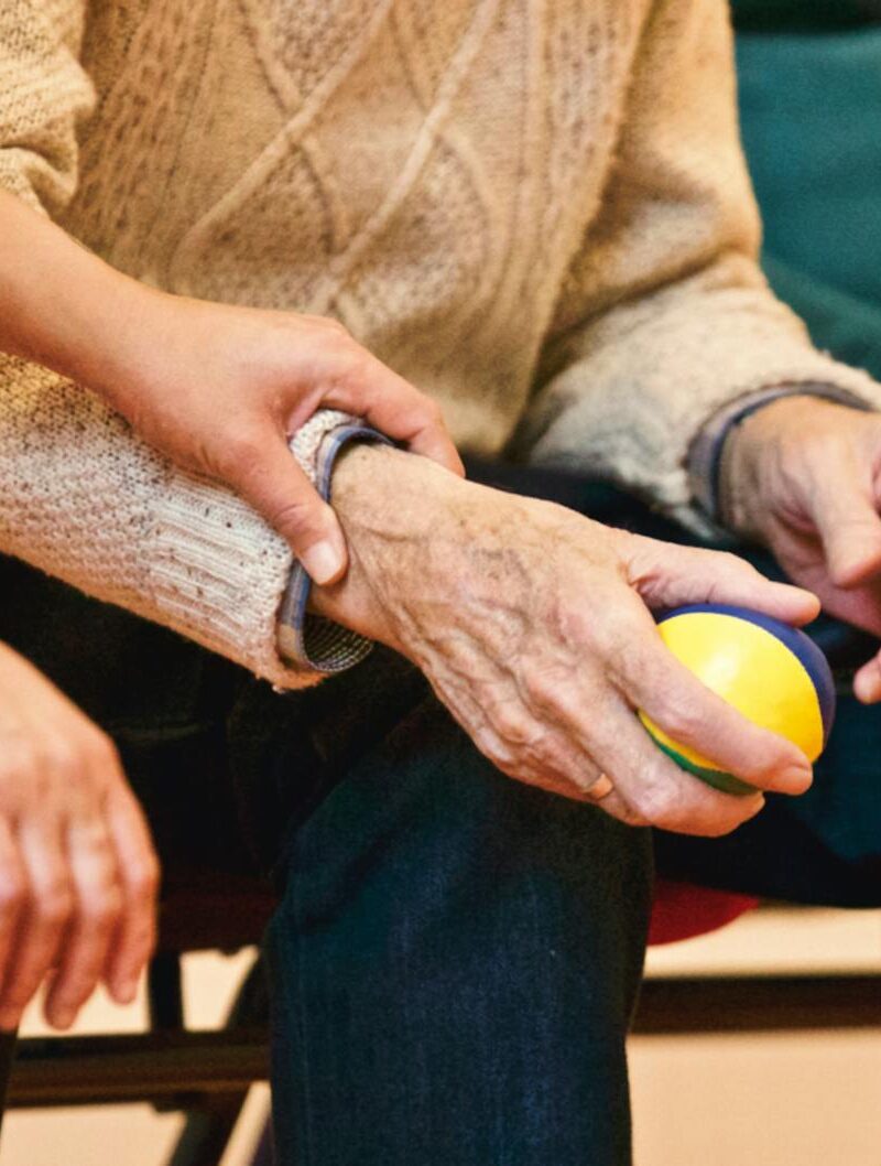 person holding a stress ball