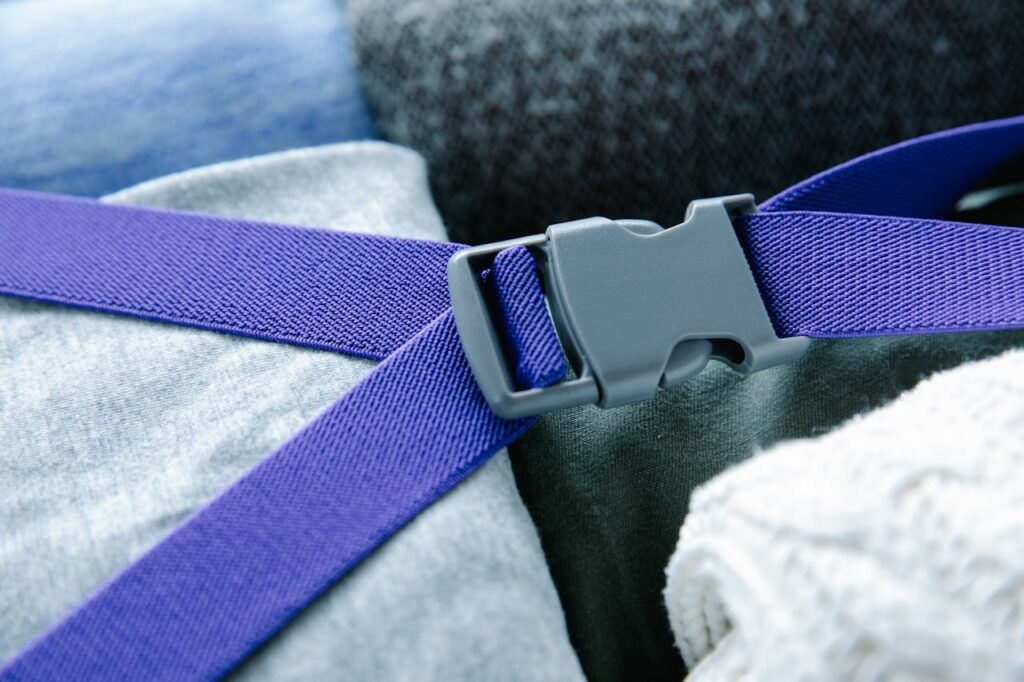 Backpack straps secured airport luggage