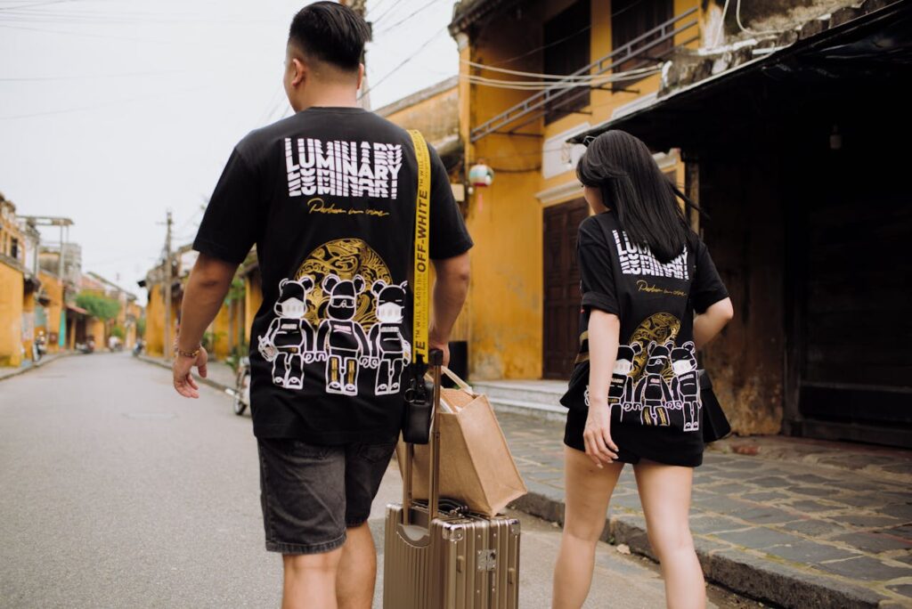 Weekend city break travel couple with small luggage