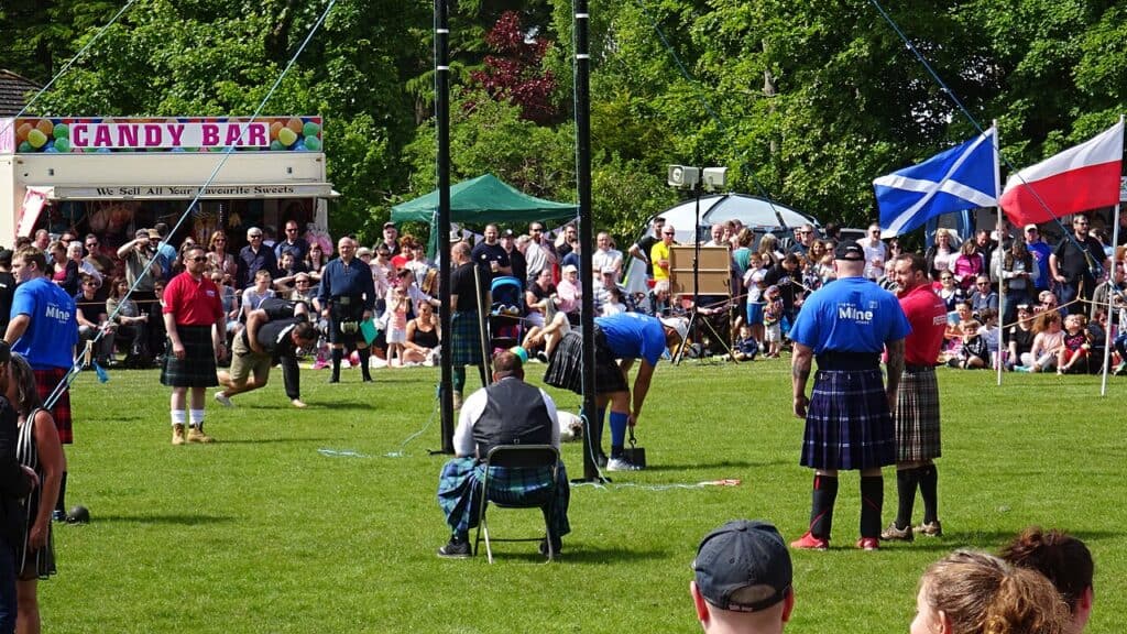 Braemar Gathering Scotland Highland Games caber toss competition