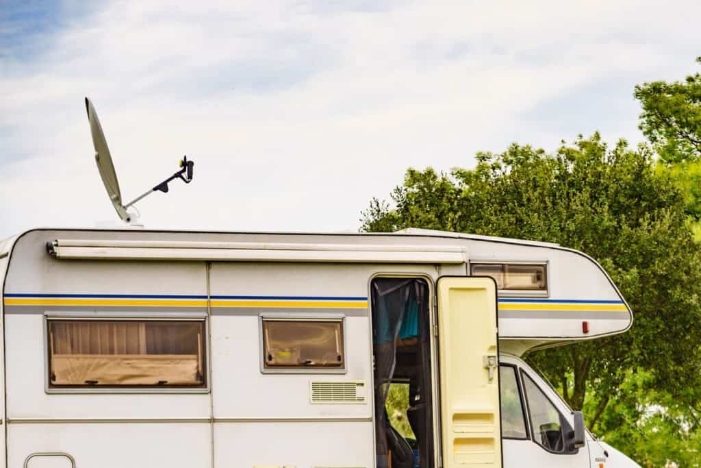 Cell booster or hotspot device mounted on an RV roof