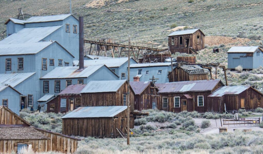 Buildings in the abandoned ghost town of Bodie California. Bodie was a busy, high elevation gold mining town in the Sierra Nevada Mountains in the early 1900s