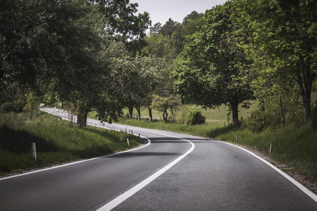 Clean highway shoulder with scenic views