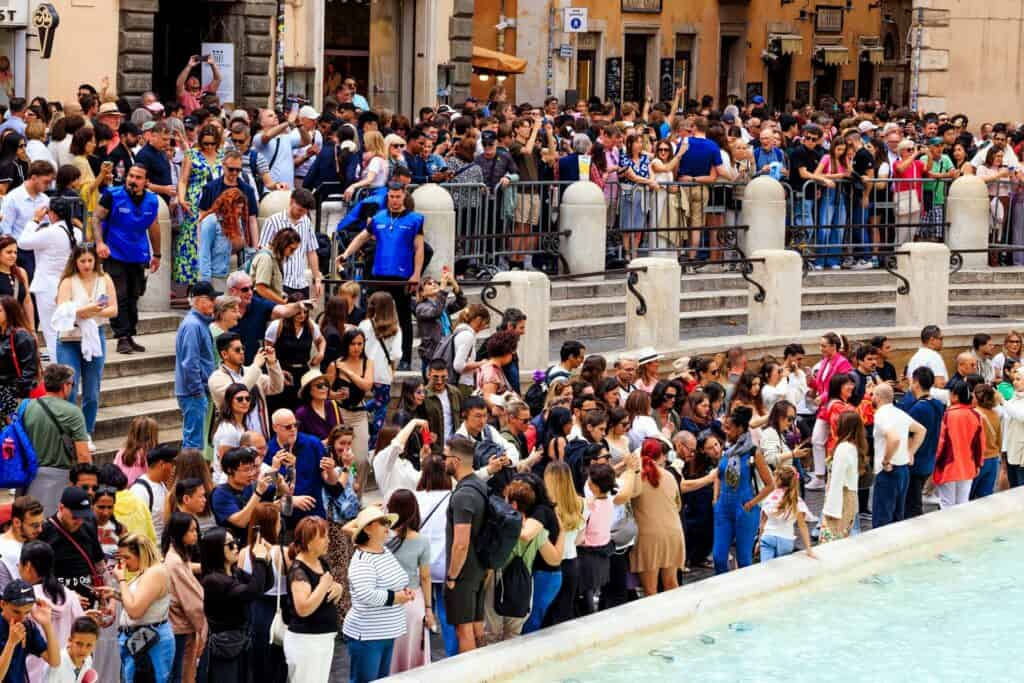 crowded Trevi Fountain Rome tourists