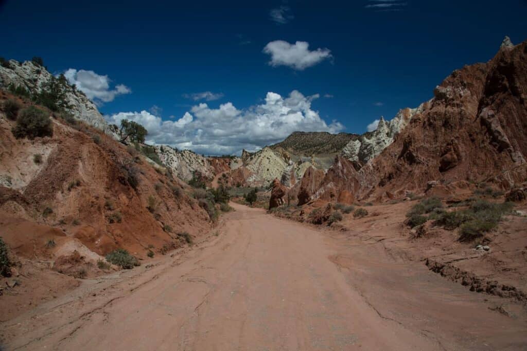 Dusty dirt road stretching into the horizon