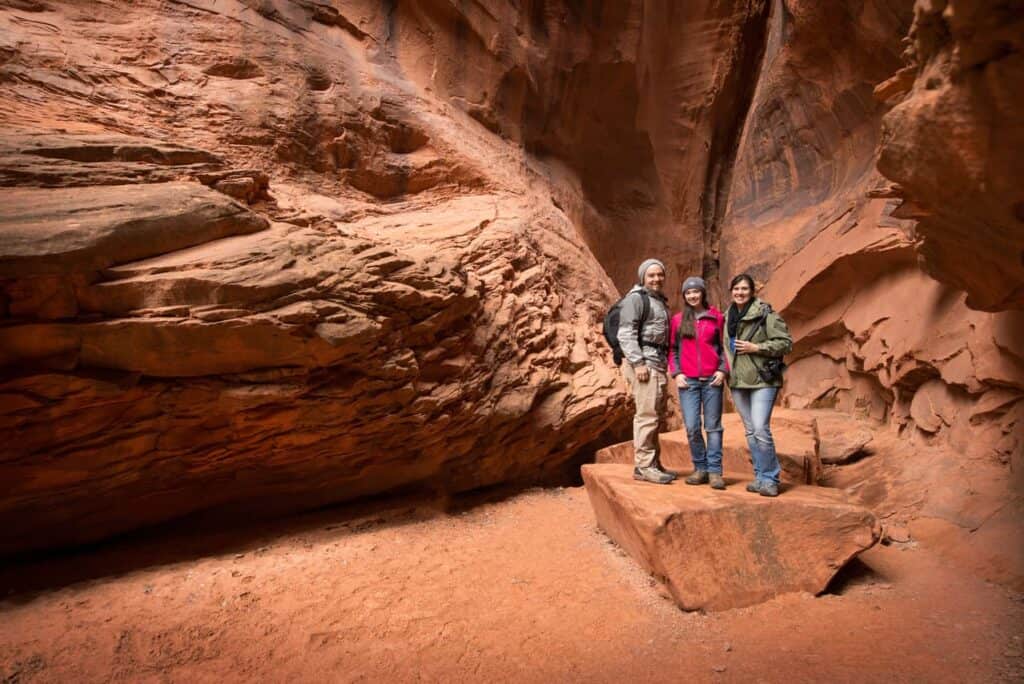 Family walking among sandstone towers