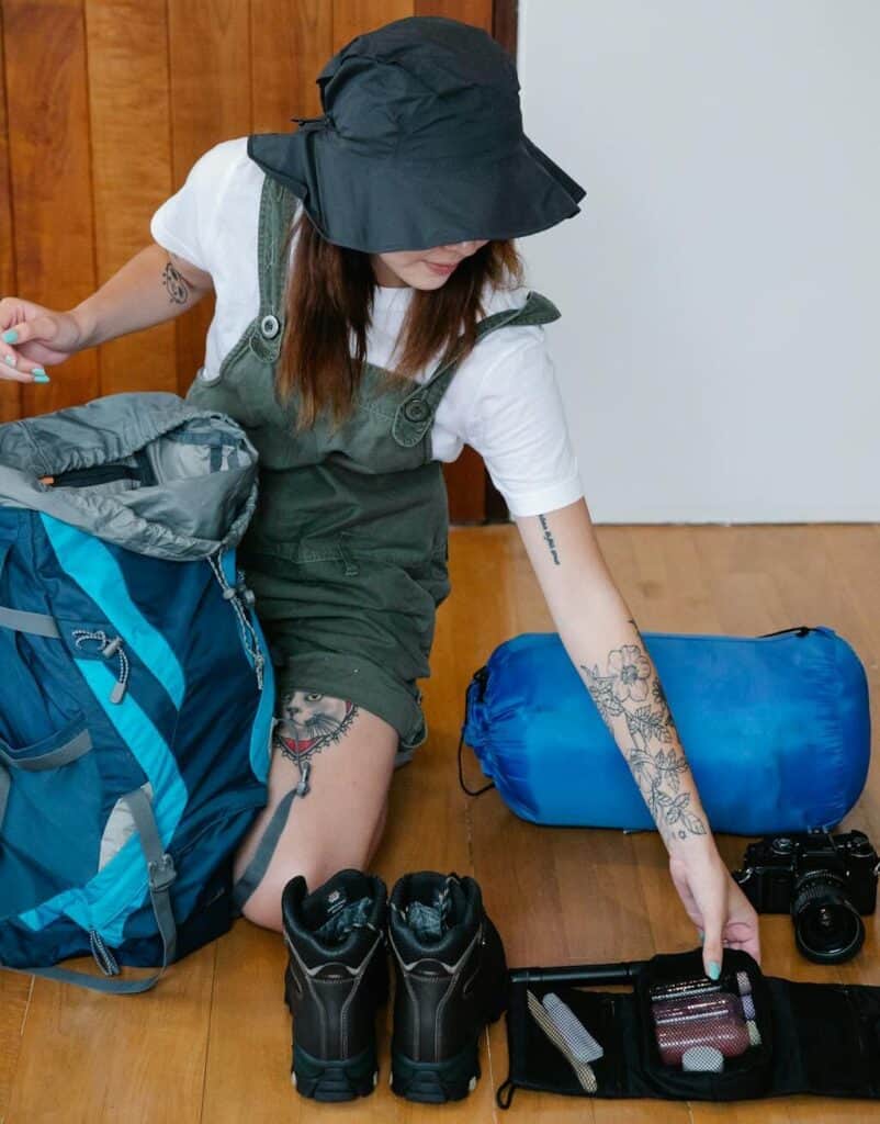 Minimal luggage with a carry-on backpack.