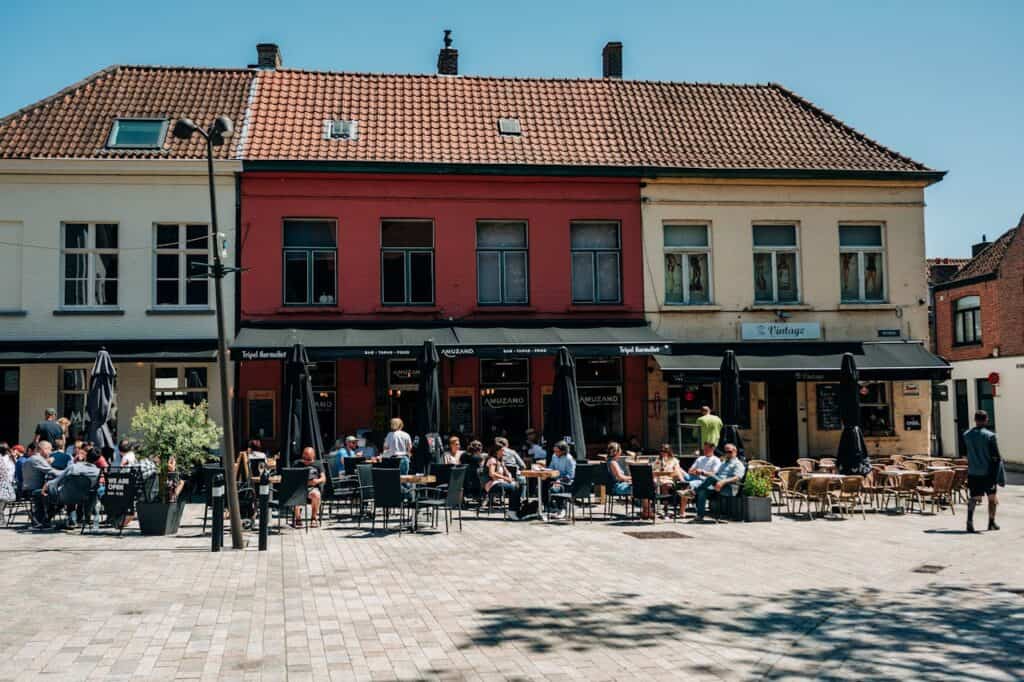  Tourists eating at a patio café near a famous site