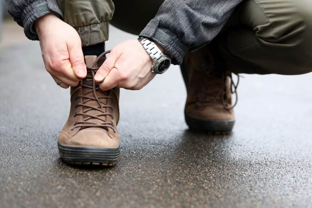 Traveler removing boots at security line
