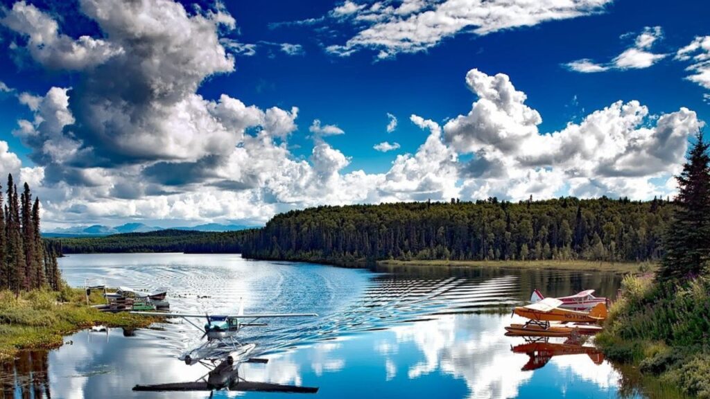 Floatplane taking off from Alaska lake