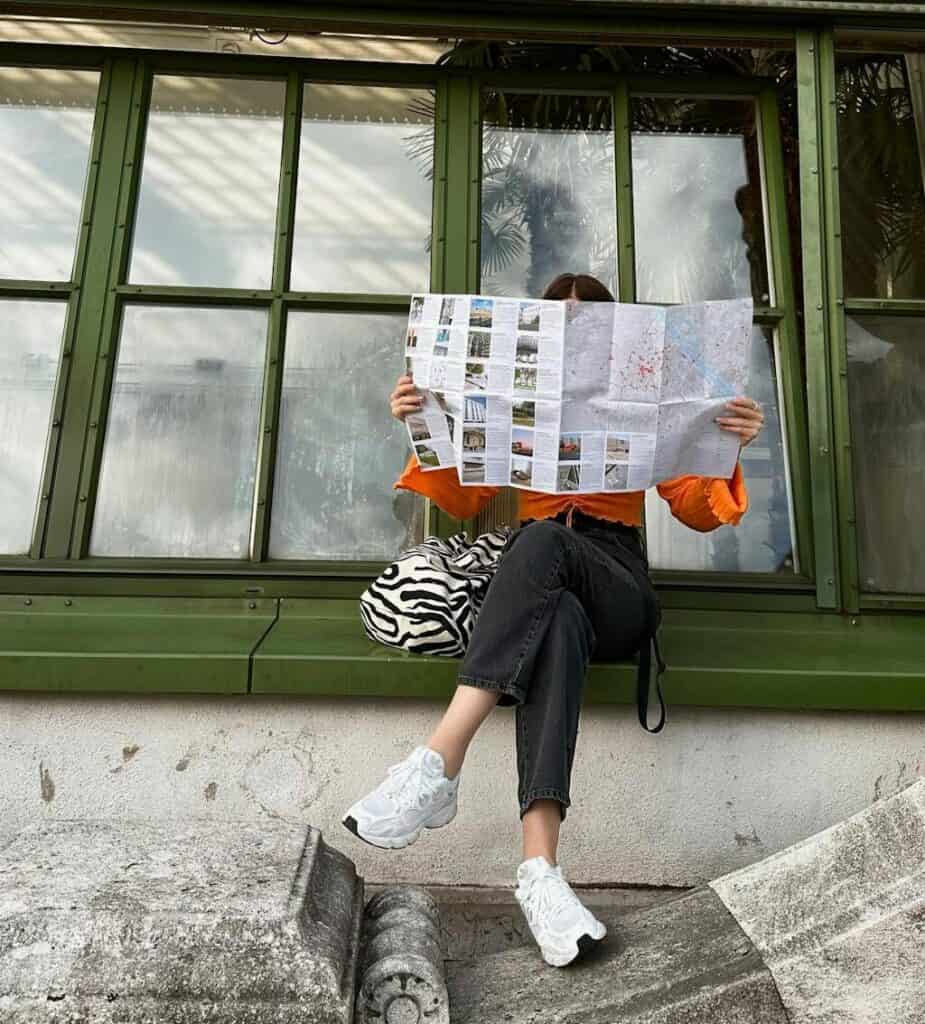Woman Reading a City Map