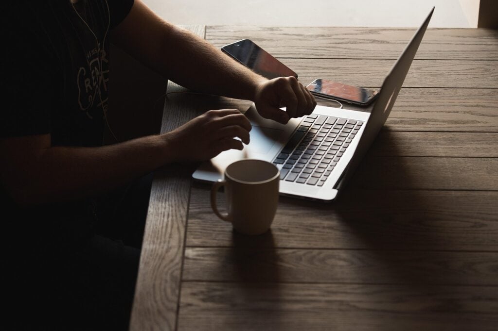 person looking at laptop