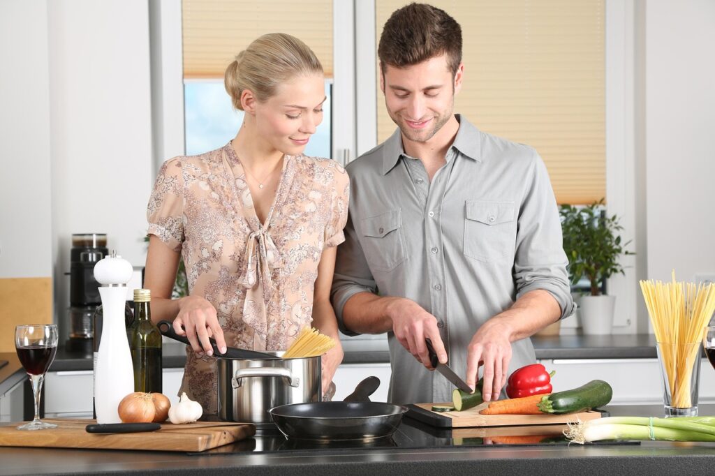 traveler cooking in vacation rental kitchen