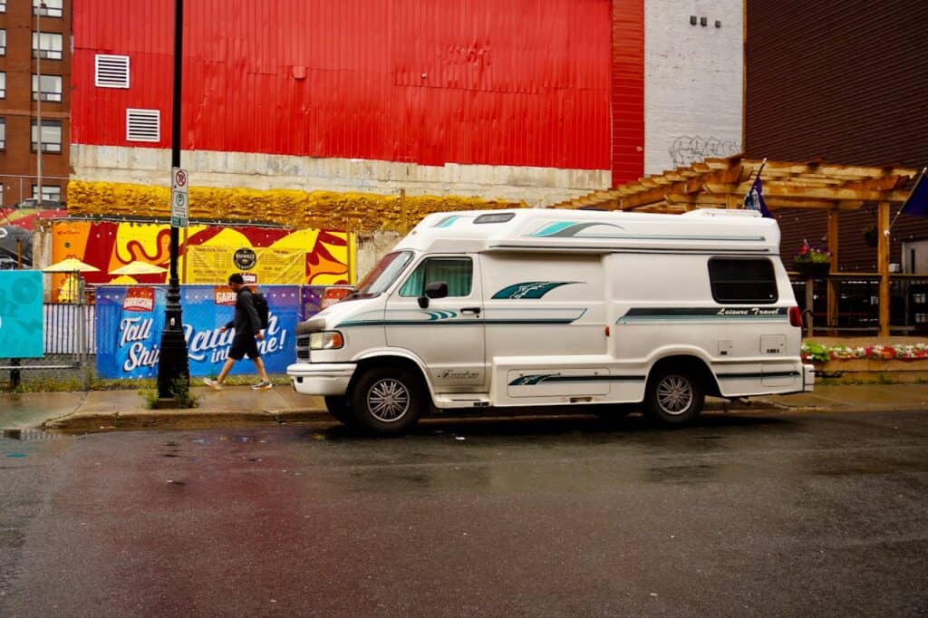 motorhome driving mountain road with trailer