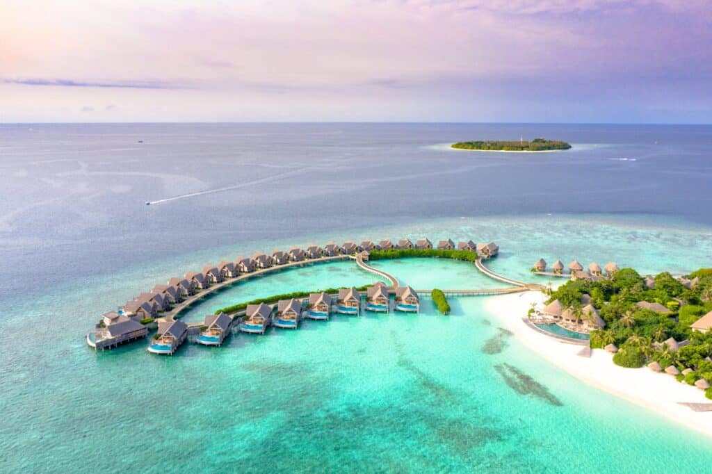 luxury overwater bungalows Maldives turquoise lagoon