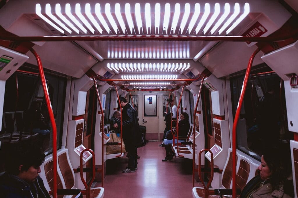 Interior of a Japanese train with passengers quietly seated 