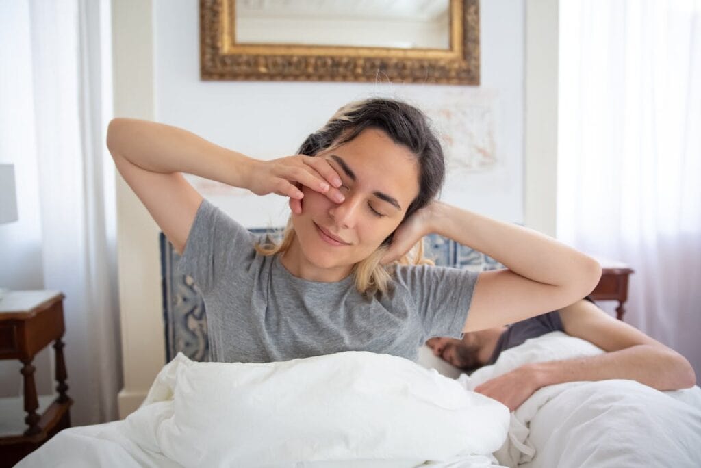 person stretching before sleep