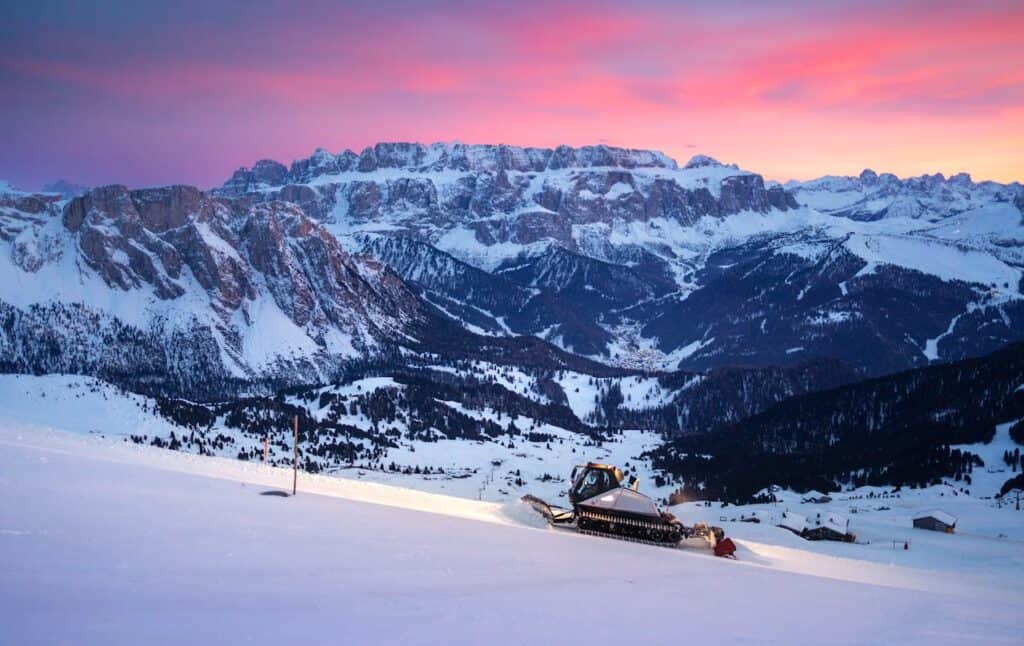 Dolomites ski slopes pink sunset