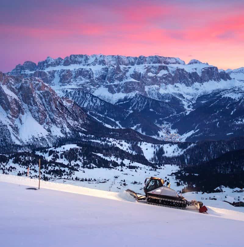 Dolomites ski slopes pink sunset