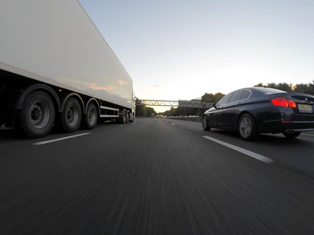 A car merging on the highway without its blinker on