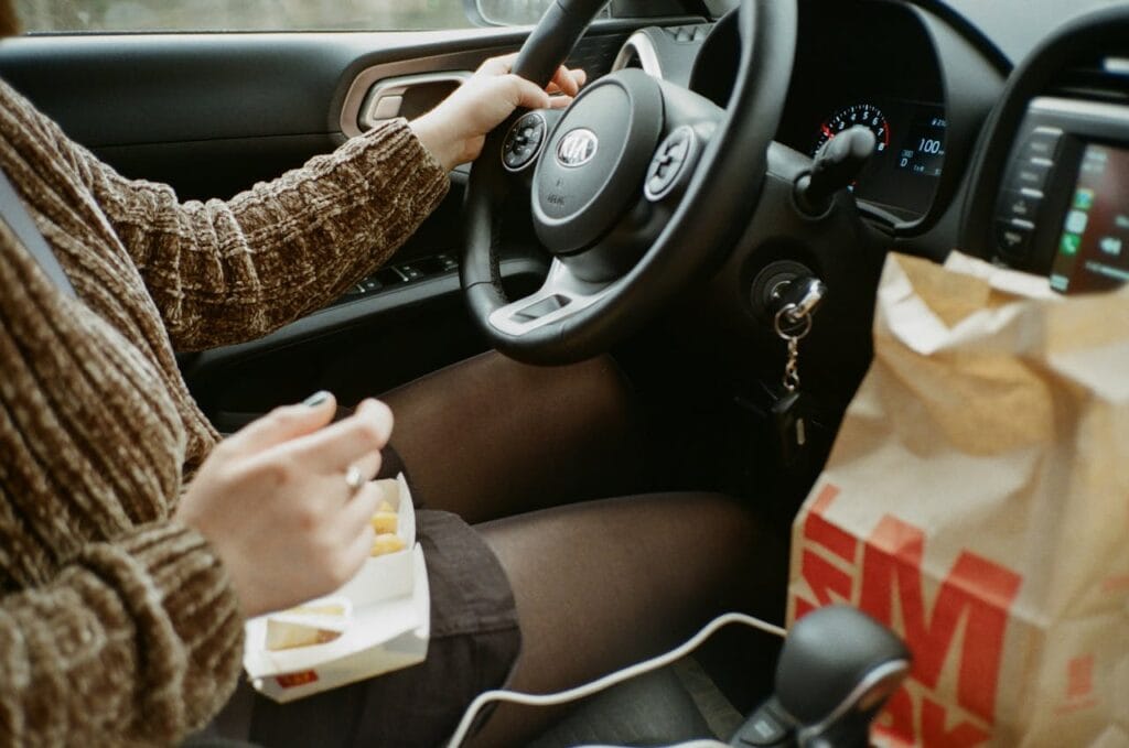 Person Driving and Eating