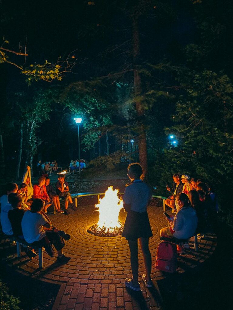 People Sitting around Fire Pit