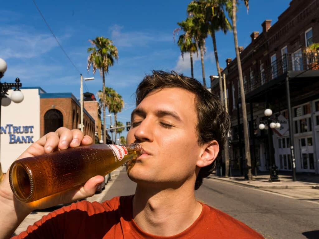 person drinking beer on street fined