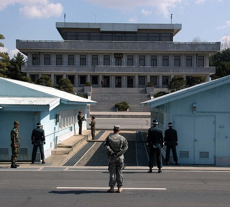road leading from Seoul toward DMZ with guard towers in distance