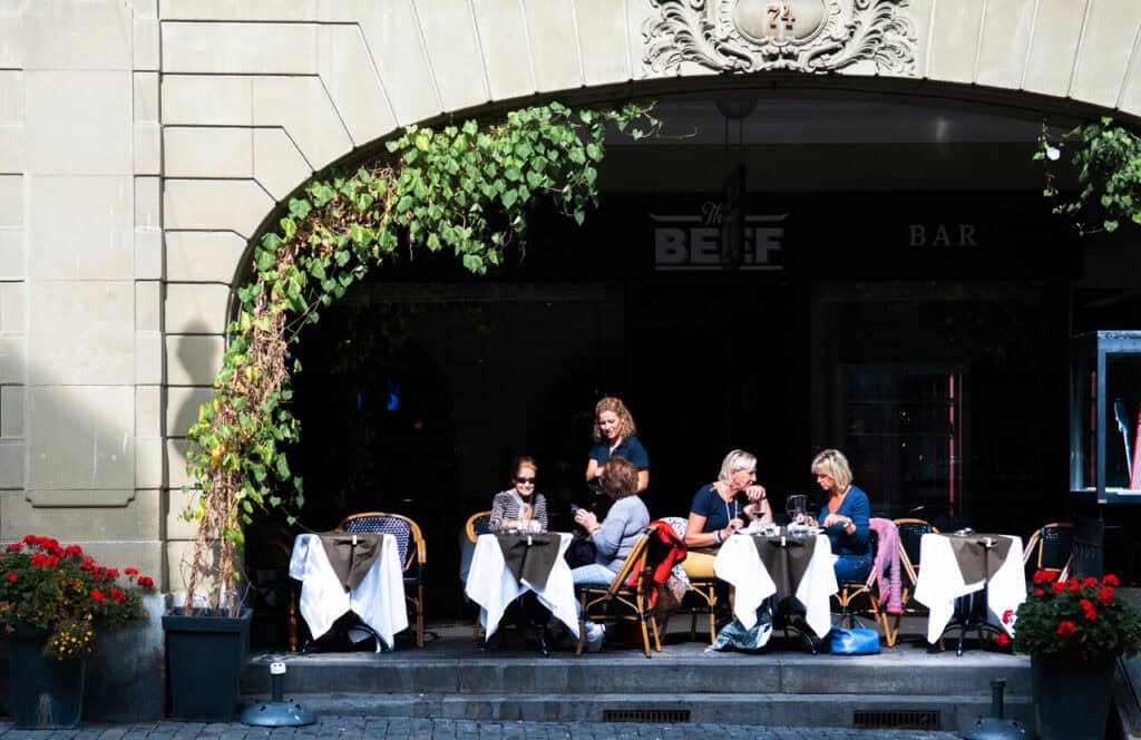 People sitting outdoors at a Zurich café