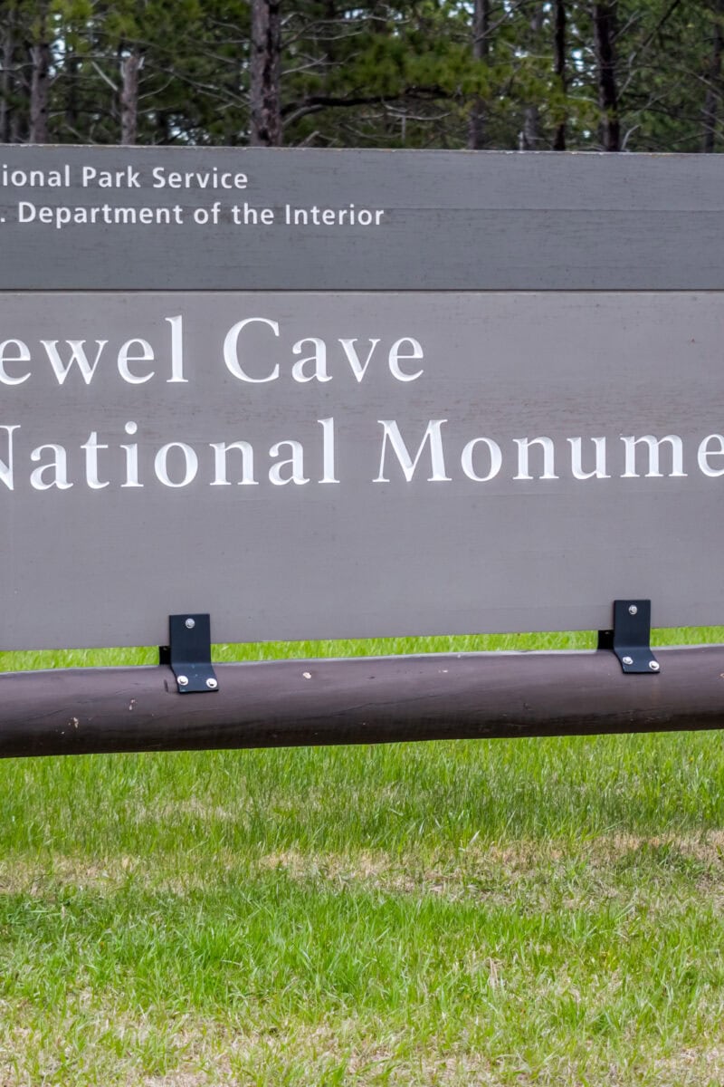 Jewel Cave NM, SD, USA - May 19, 2019: A welcoming signboard at the entry point of preserve park