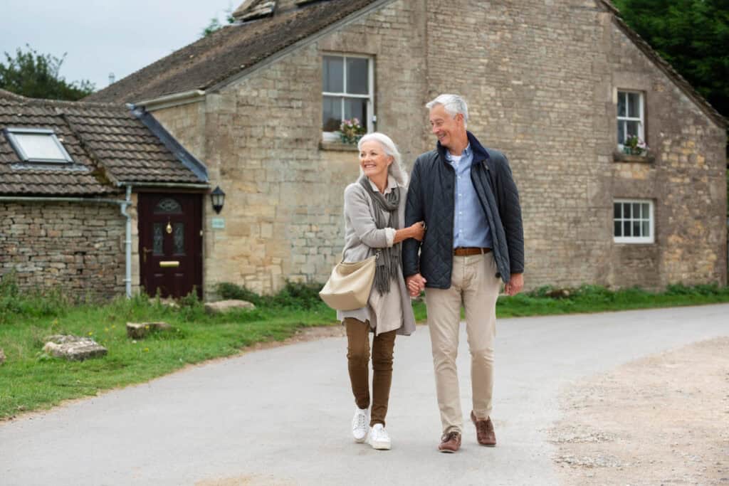 retired couple walking scenic small town USA