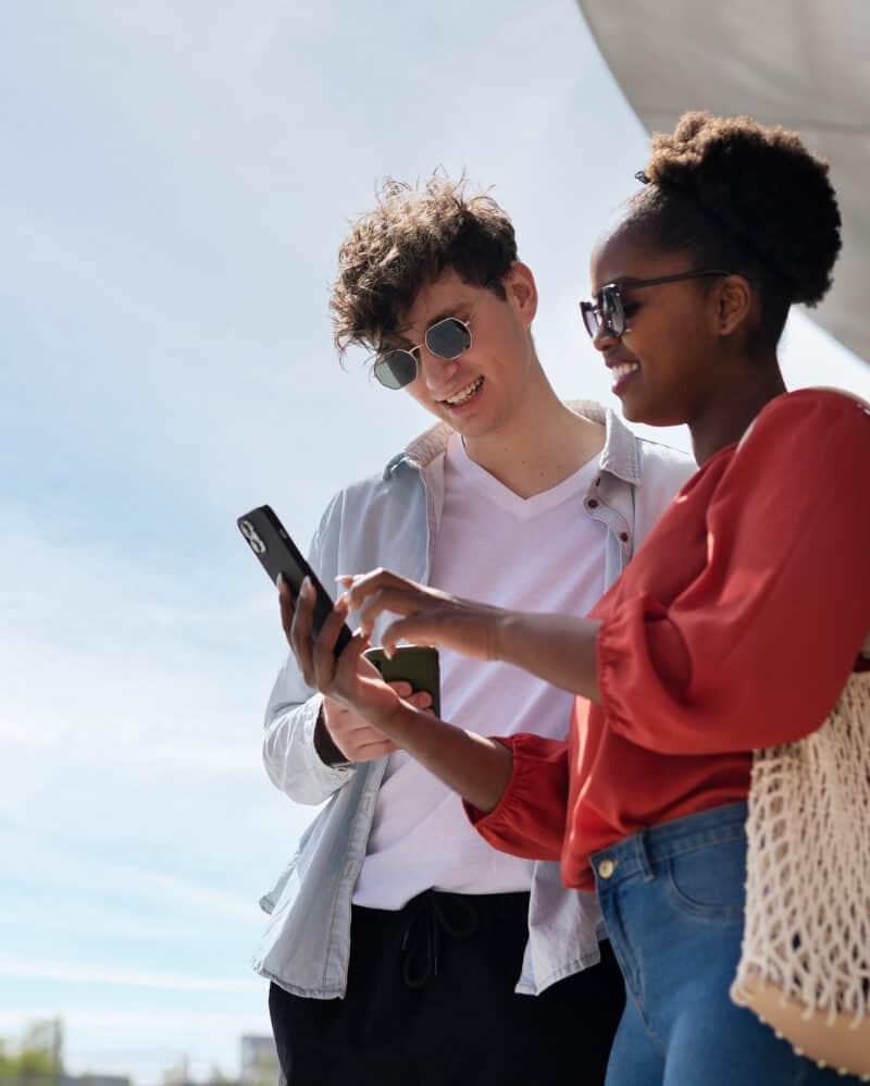 tourist using phone airport