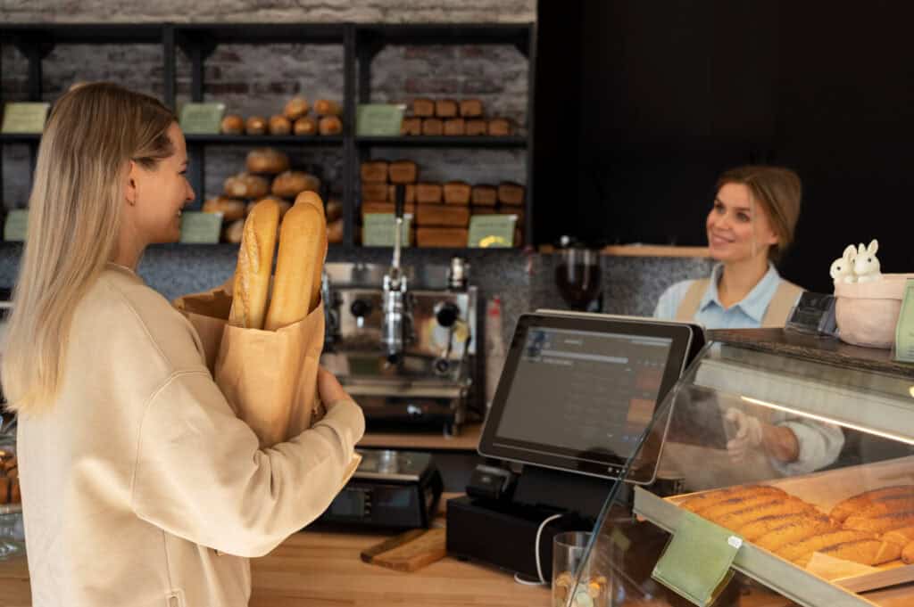 modern café or bakery with touchscreen payment terminal