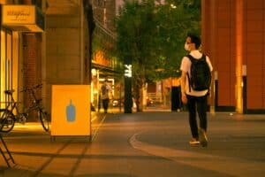 city night stroll traveler small bag minimalist setup"