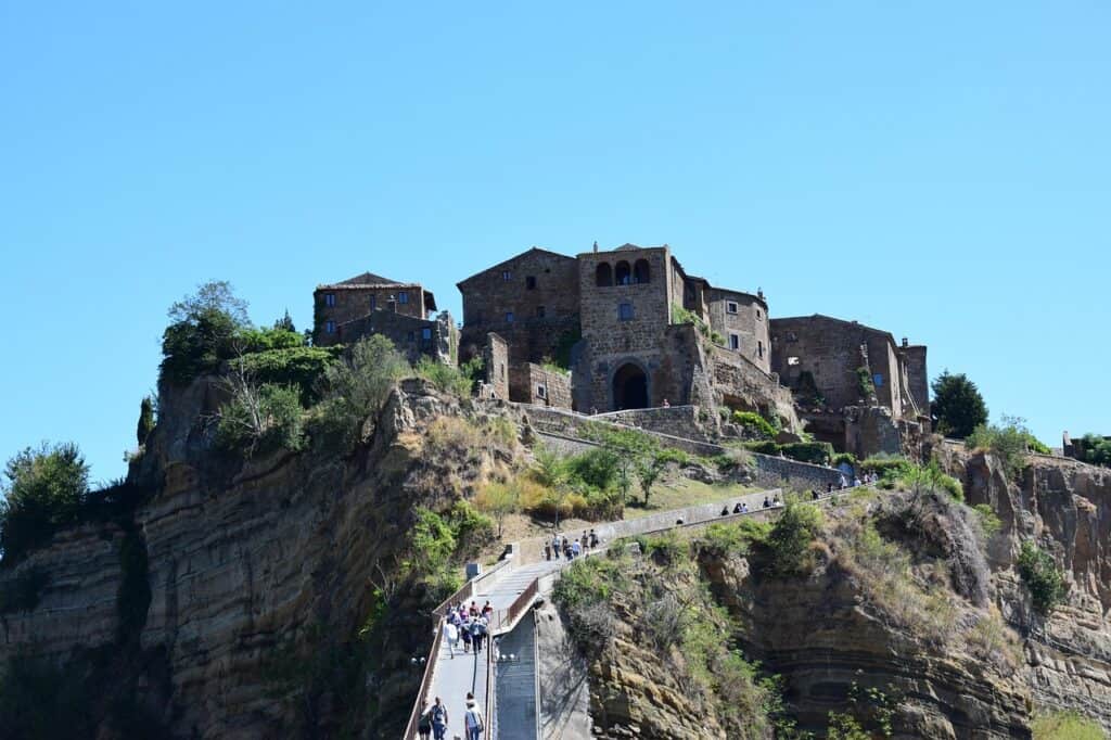 close-up of crumbling edges or landslide scars near Civita’s base